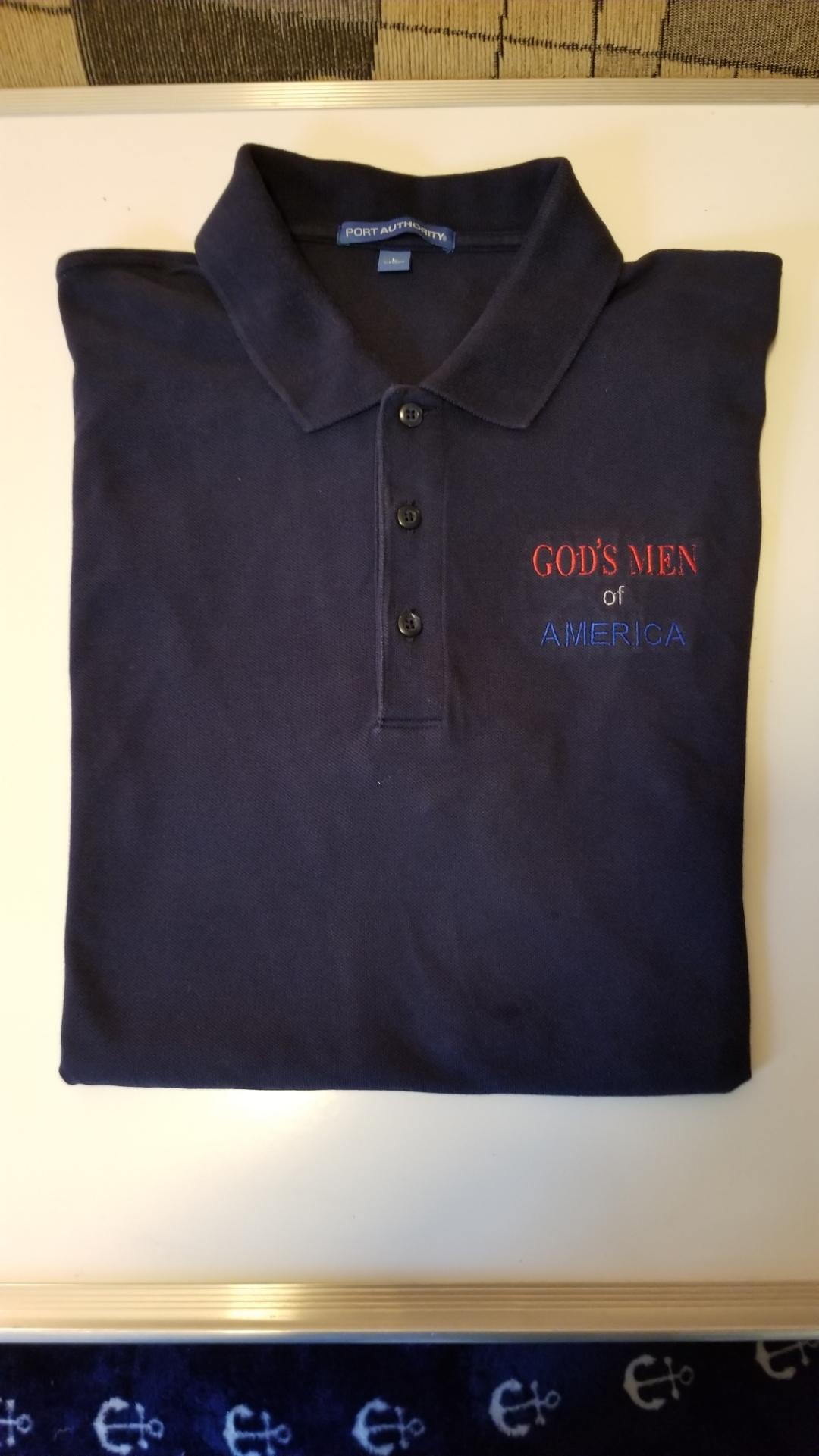 Navy polo shirt embroidered with God's Men of America